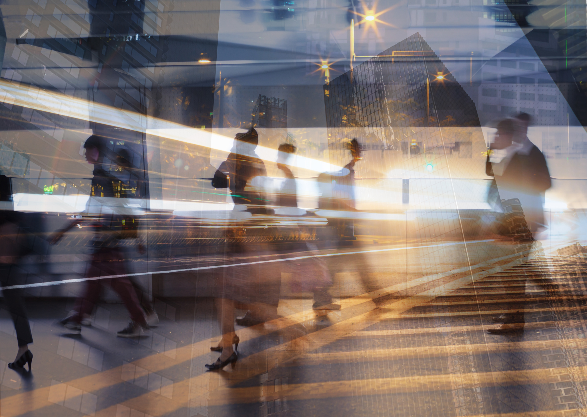 business people moving through a business city symbolizing thriving at a time of trade and tariff uncertainty