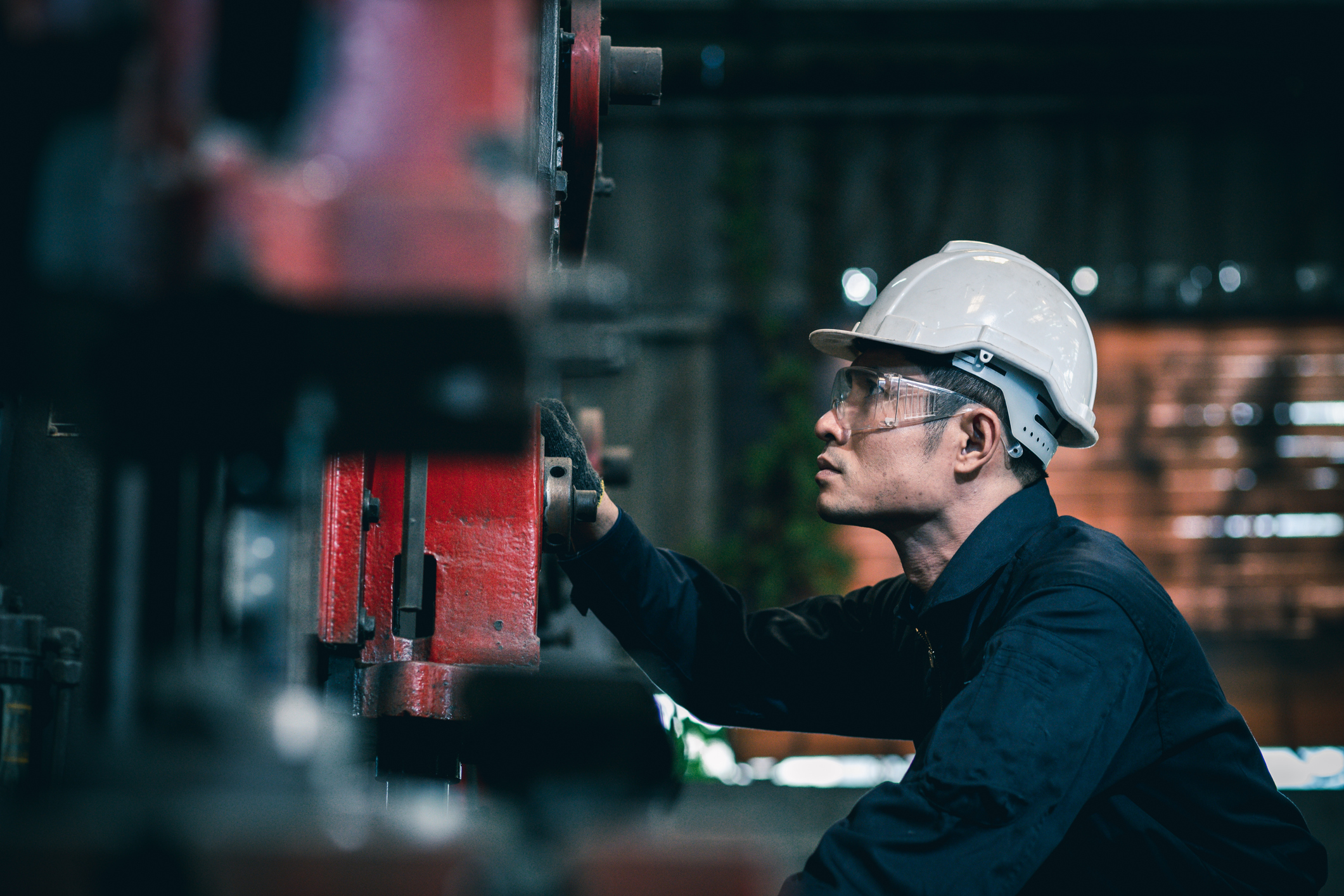 Worker at a machine illustrating the Productivity Mega Deduction