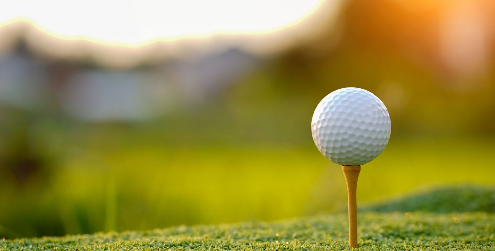 Golf ball on a tee symbolizing M&A merger between LIV Golf and PGA