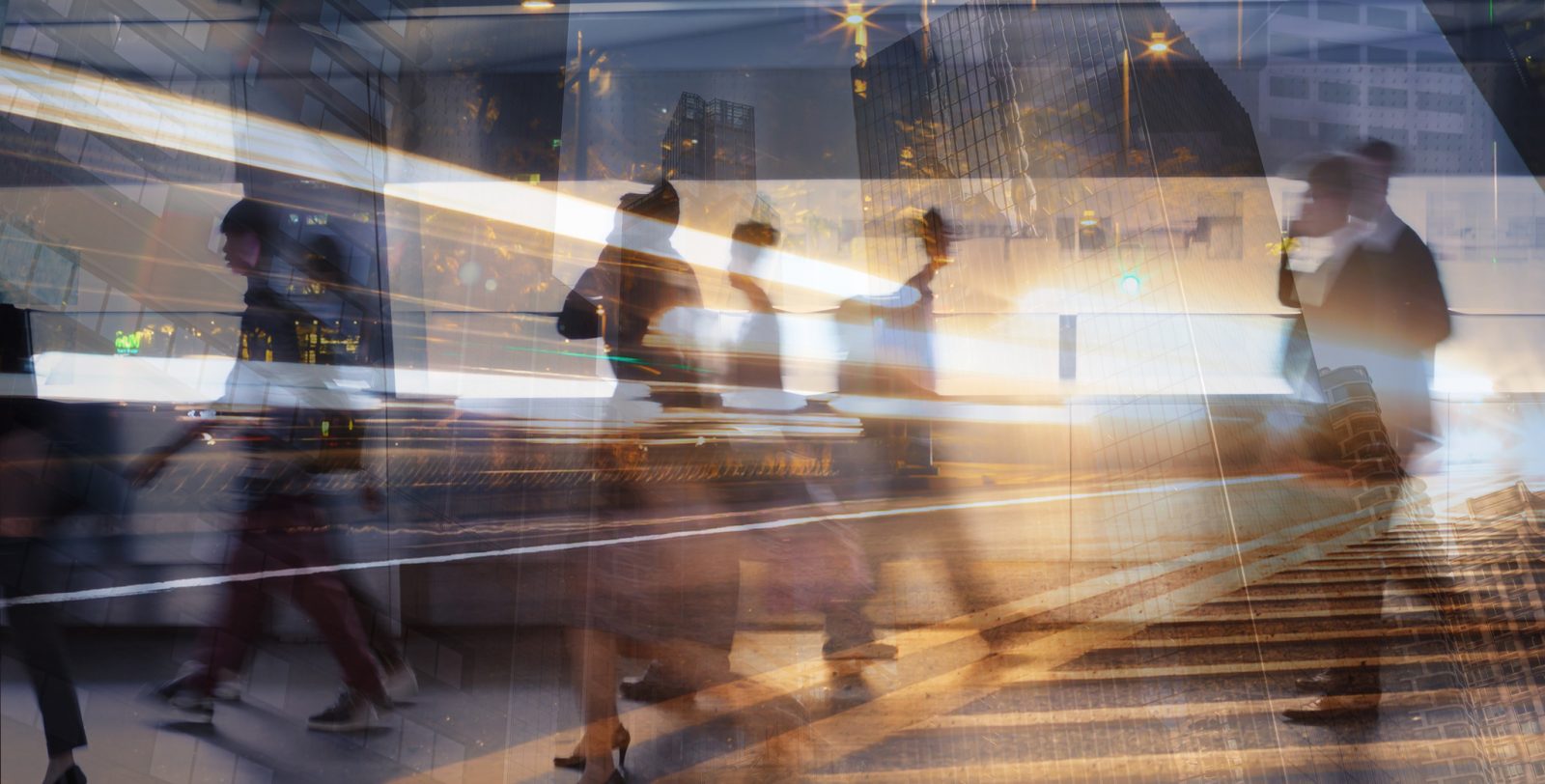 business people moving through a business city symbolizing thriving at a time of trade and tariff uncertainty